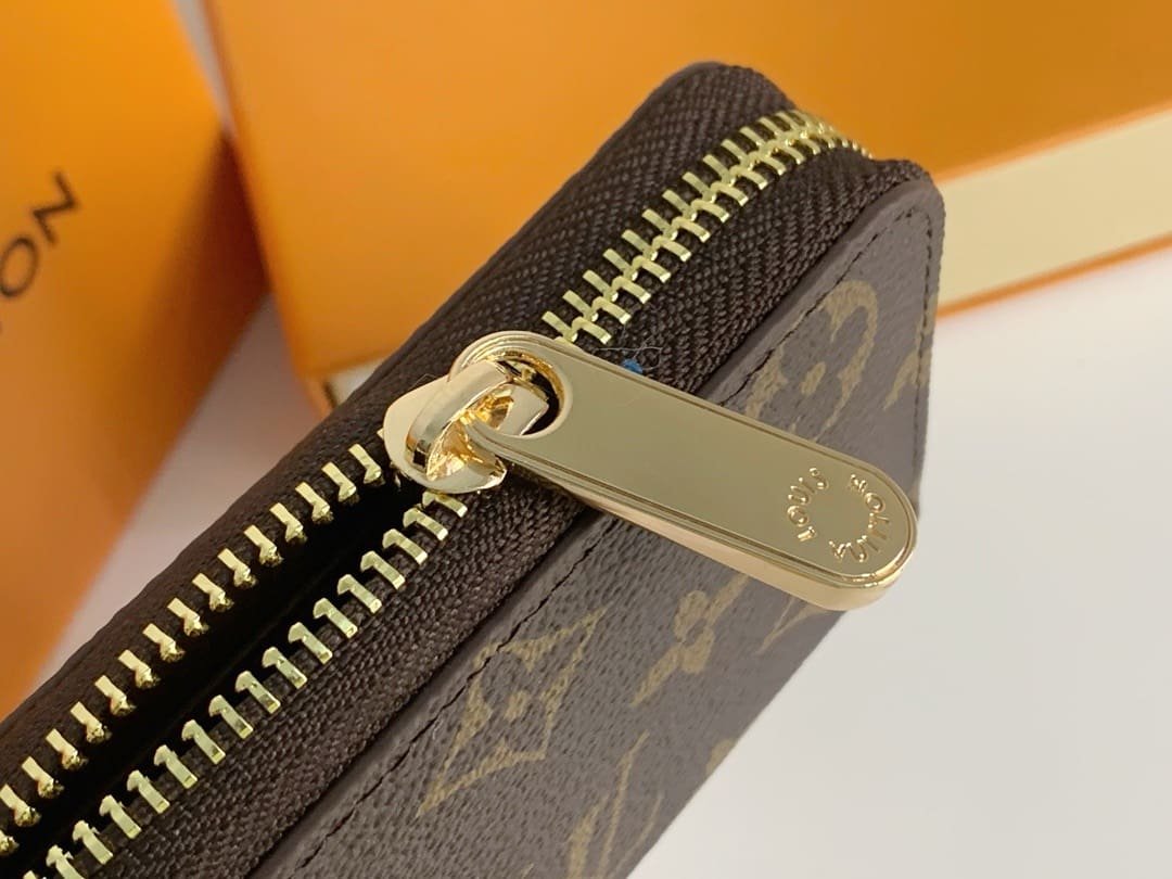 L0vis Vvtt0n M60067 Zippy Coin Purse